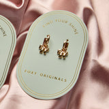 Bow Huggie Hoop Earrings in Gold