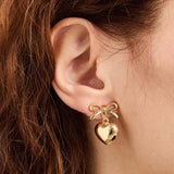 Bow Drop Earrings in Gold