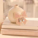 Bow Drop Earrings in Silver