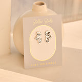 Rosette Earrings in Silver